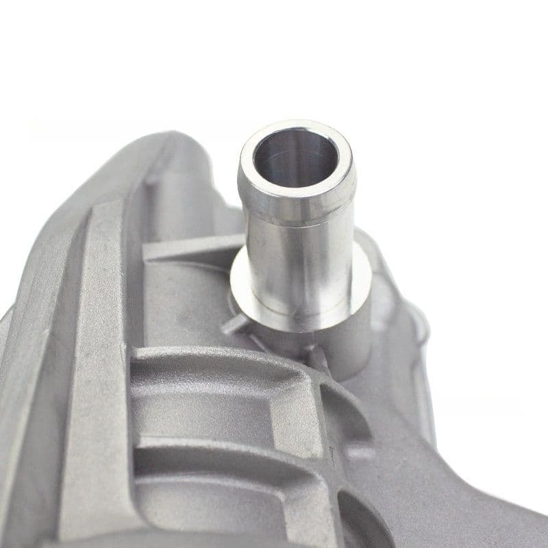 Coolant port close-up of Mercedes-Benz oil filter housing assembly 2701800810